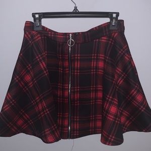 red plad medium length skirt